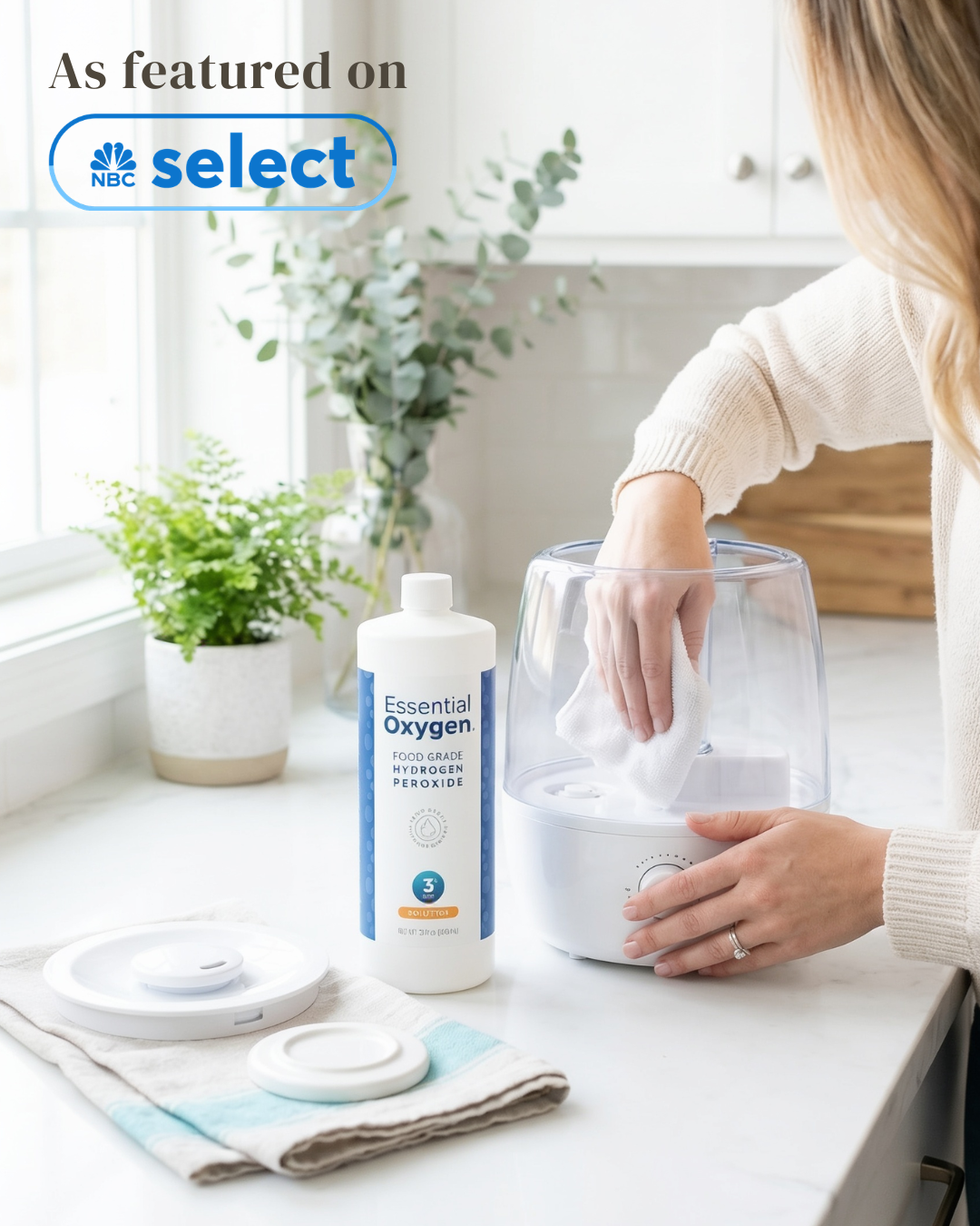 Hydrogen peroxide and cloth beside a humidifier being cleaned