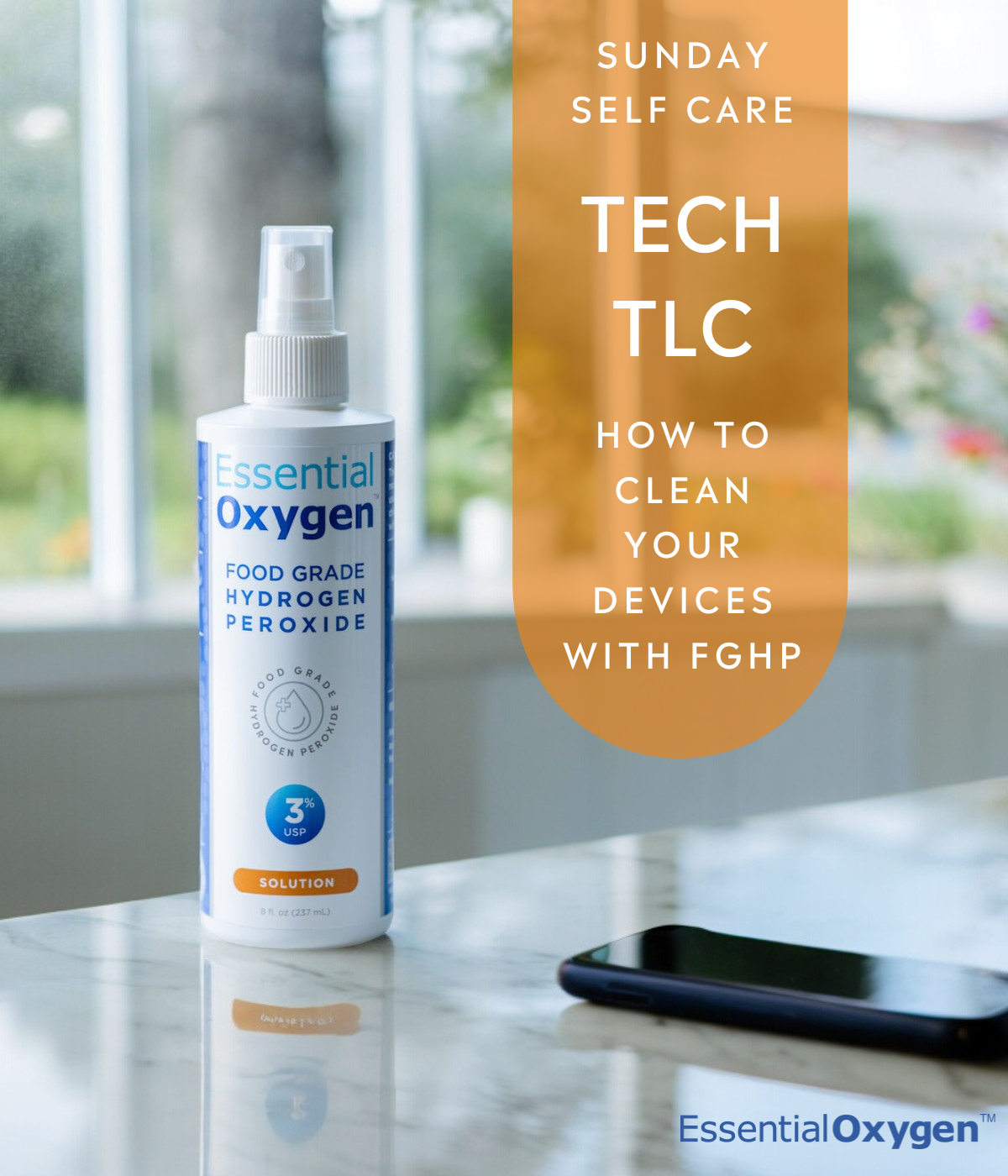 TECH TLC | How To Clean Your Electronics With Essential Oxygen Food Grade Hydrogen Peroxide; Food grade hydrogen peroxide spray bottle on desk next to clean phone electronic device